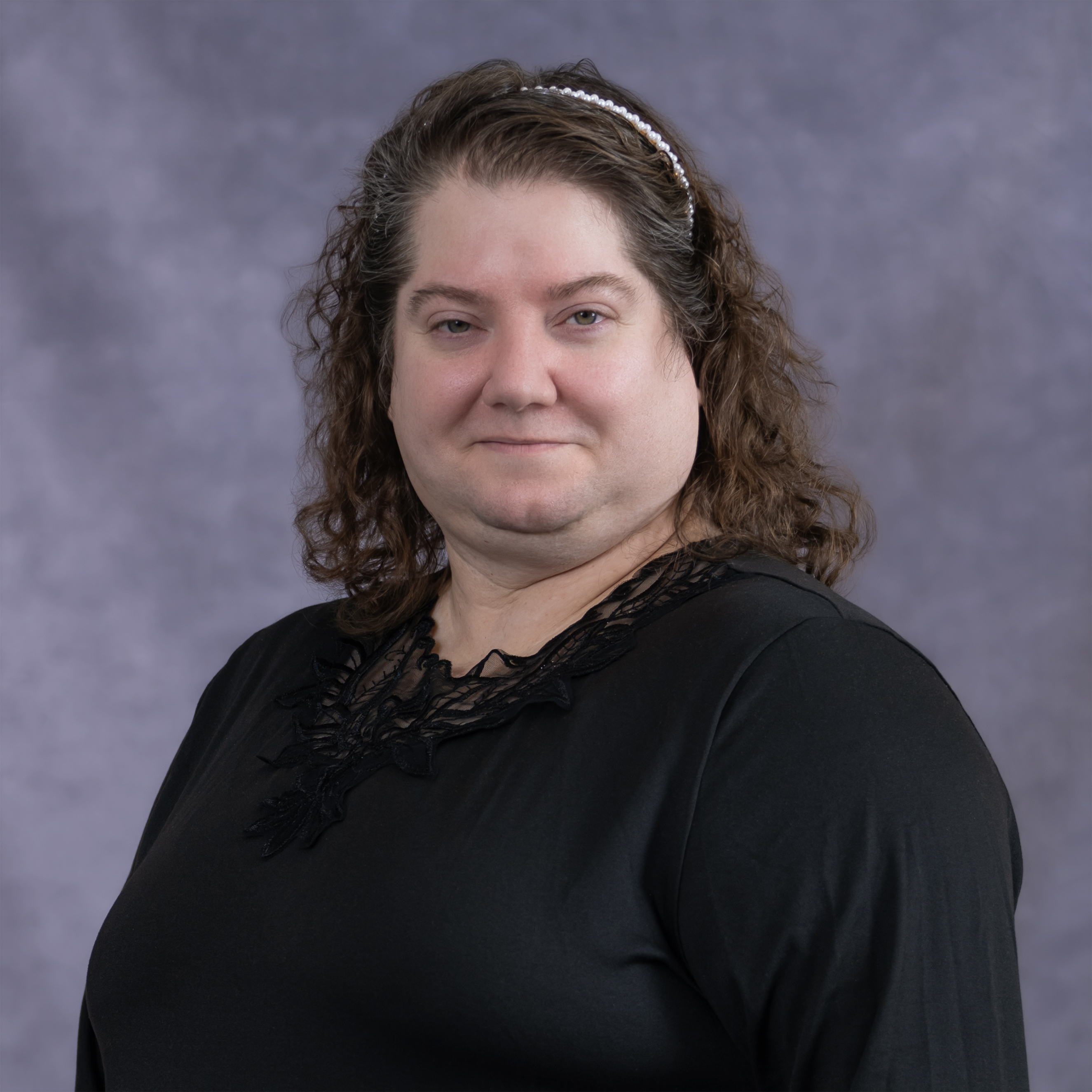 Headshot of Edith Harvey with a black shirt